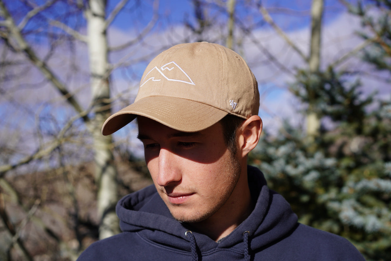 mountain hat. ocean hat. hat with mountains. baseball hat.