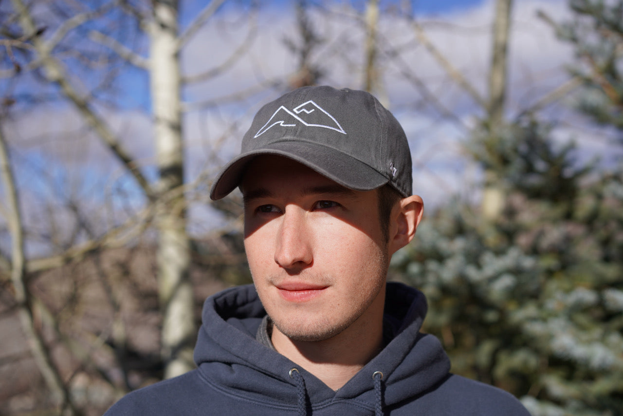 mountain hat. ocean hat. hat with mountains. baseball hat.